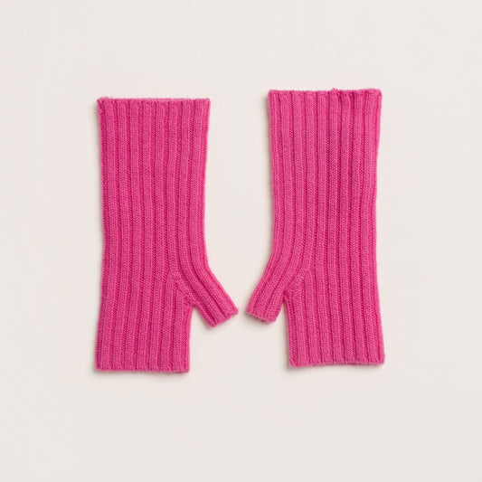 Pair of pink wool and cashmere knitted wrist warmers laid flat