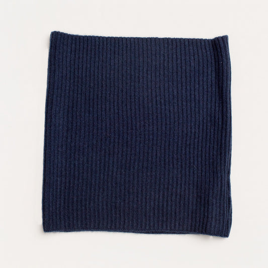 Navy blue cashmere snood laid flat