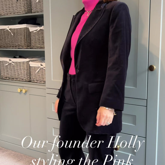 styling of a pink polo neck 