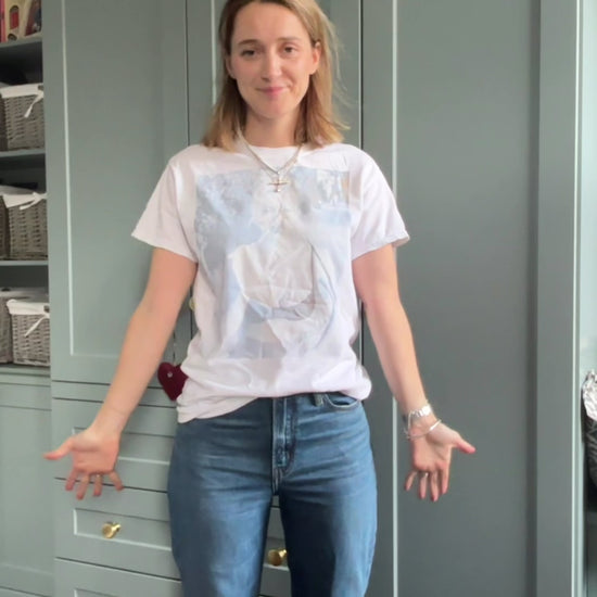 video of a blue v neck cardigan being styled