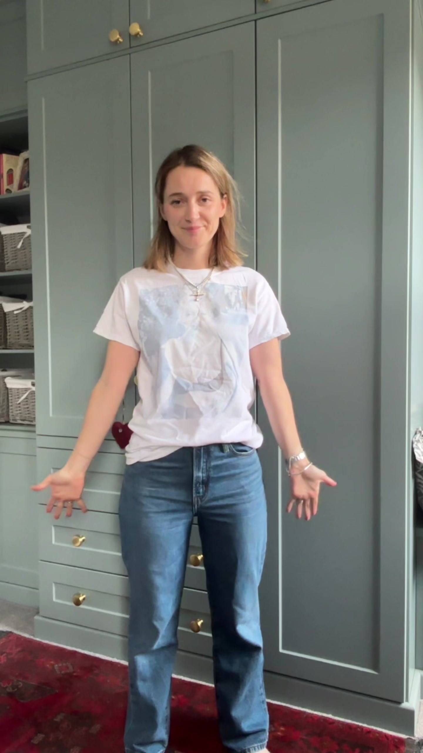 video of a blue v neck cardigan being styled